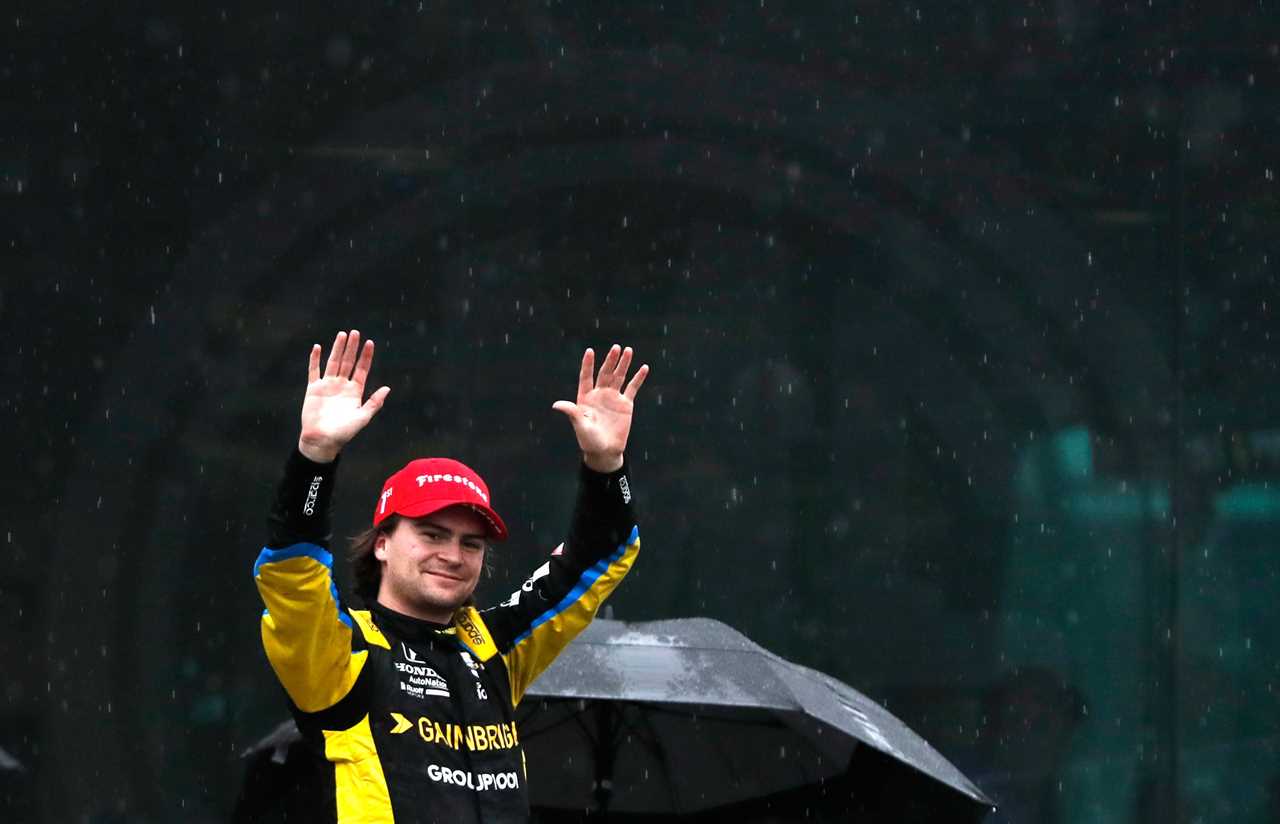 Andretti Autosport with Curb-Agajanian driver Colton Herta's (26) celebrates after winning the GMR Grand Prix, Saturday, May 14, 2022, at Indianapolis Motor Speedway in Indianapolis.