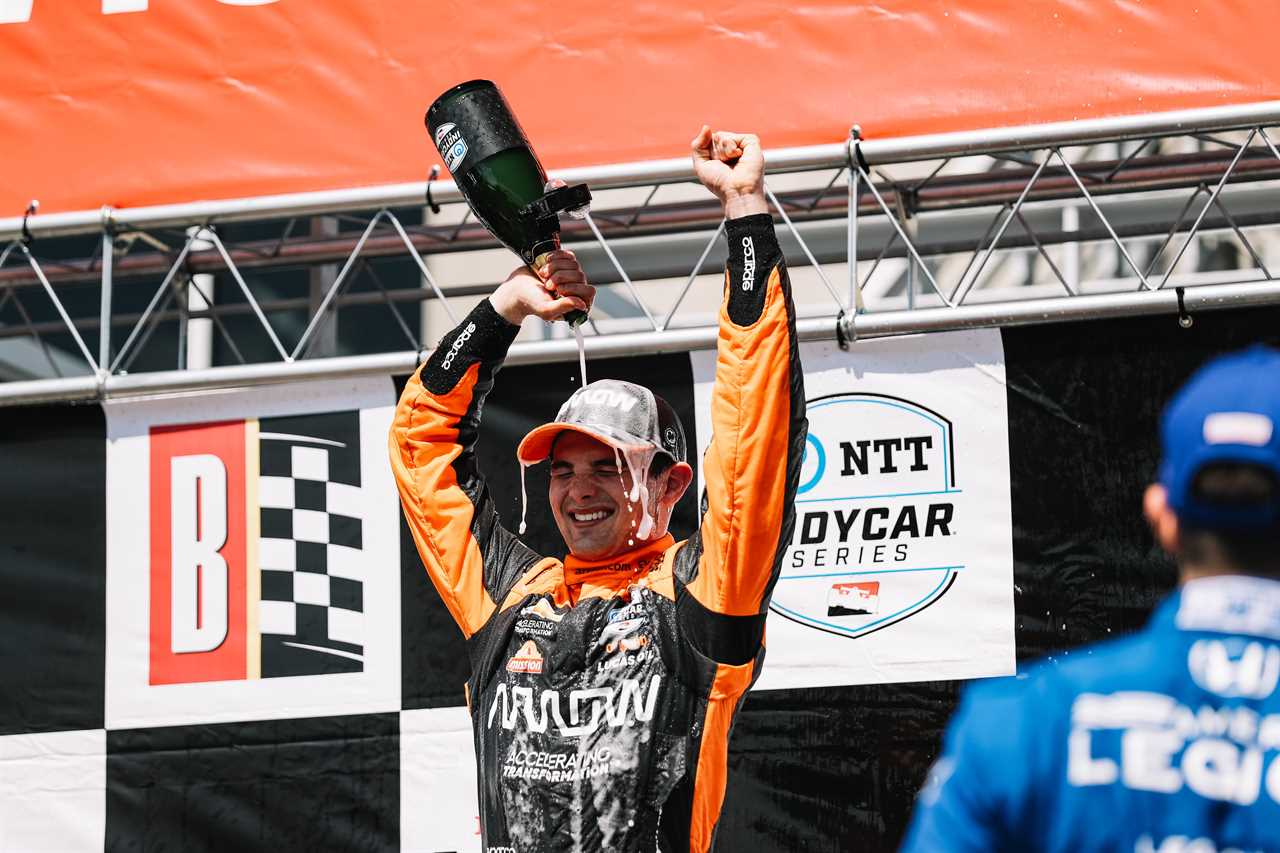 Pato O'Ward celebrates after securing his first IndyCar win of 2022 at Barber Motorsports Park.