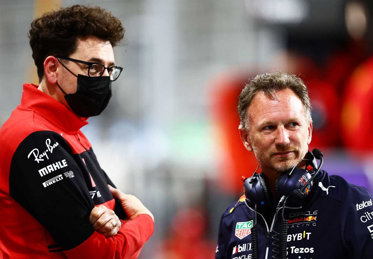 Ferrari team principal Mattia Binotto (left) and Red Bull team principal Christian Horner (right) share a moment during the 2022 F1 Saudi Arabian GP (Photo by Mark Thompson/Getty Images)