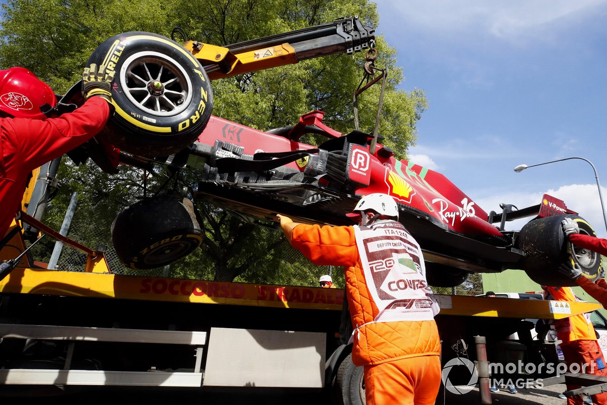 Charles Leclerc's car, Ferrari SF21, is loaded onto a truck