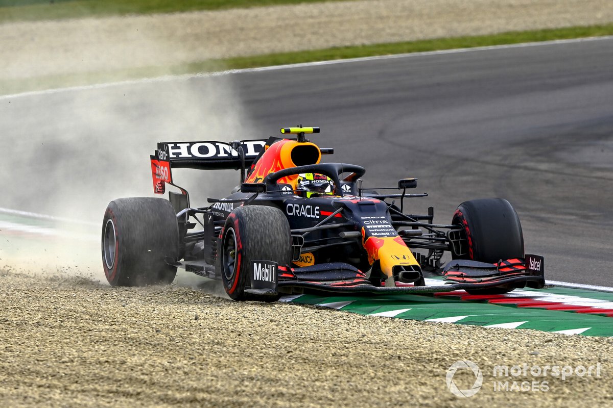 Sergio Perez, Red Bull Racing RB16B, runs wide