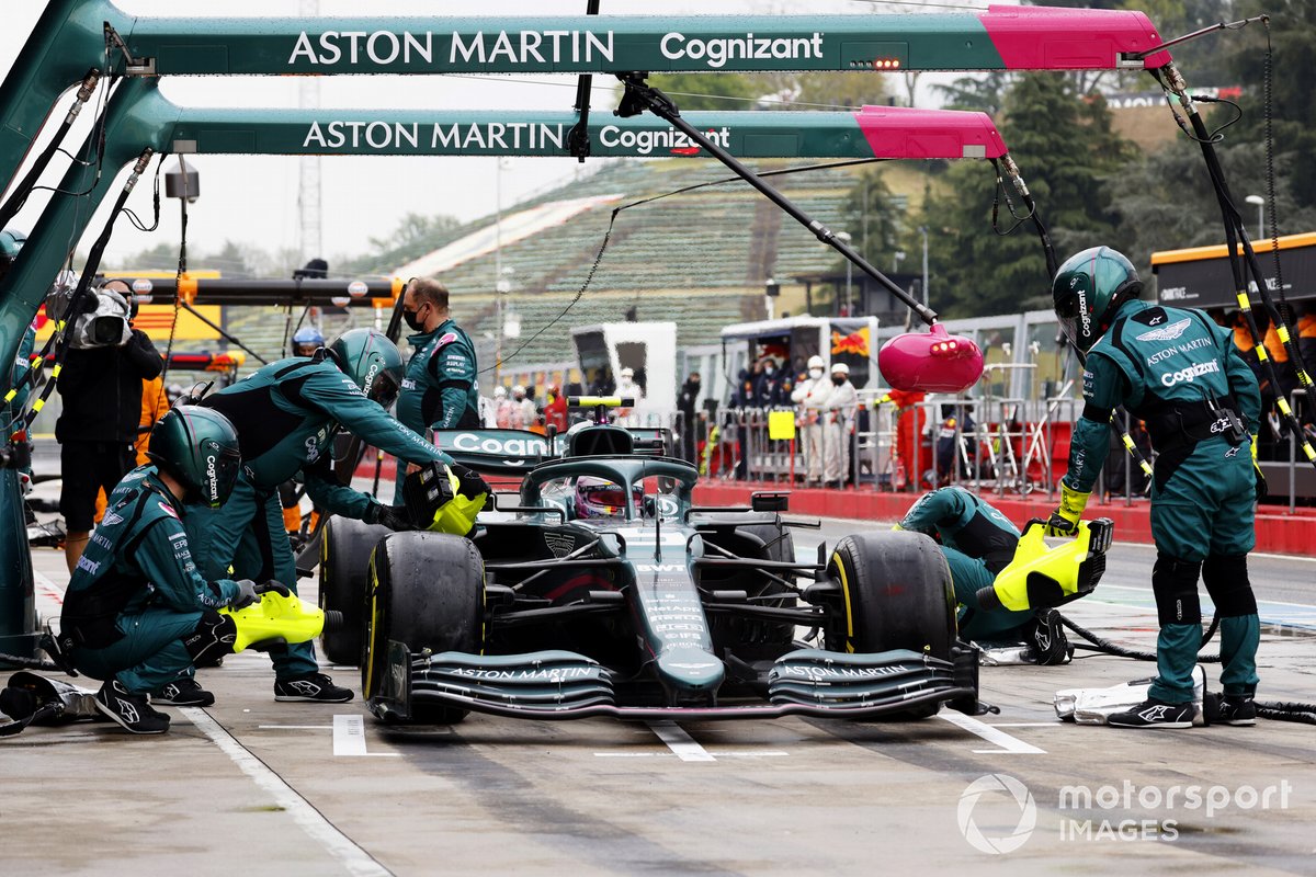 Sebastian Vettel serves a 10-second stop-go penalty