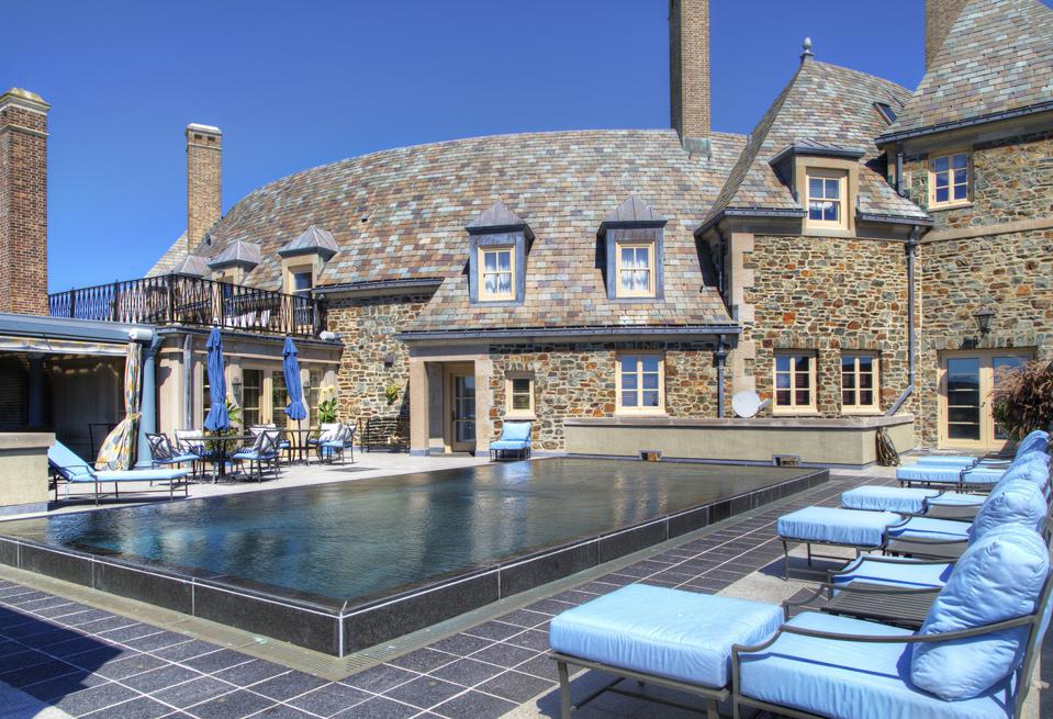 A pool and seating provides ample room for guests. 