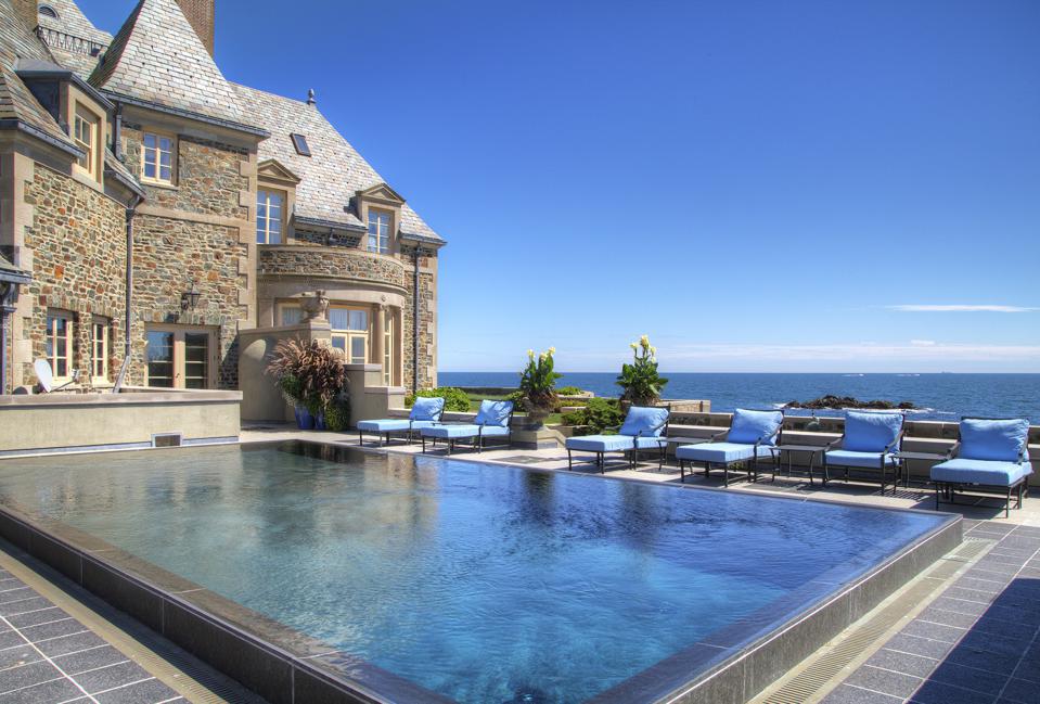 an infinity pool overlooks the Atlantic Ocean.