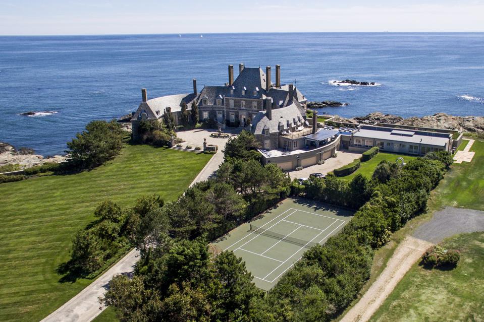 The home boasts an inimitable crescent-shape design that follows the curve of the land and allows for 270-degree views of the Atlantic. 