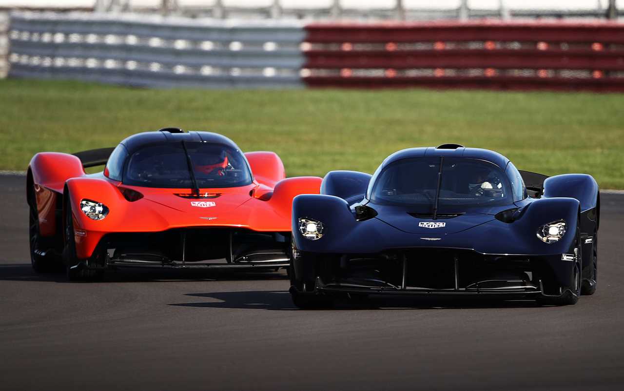 Max Verstappen and Alex Albon from F1 test the Aston Martin Valkyrie