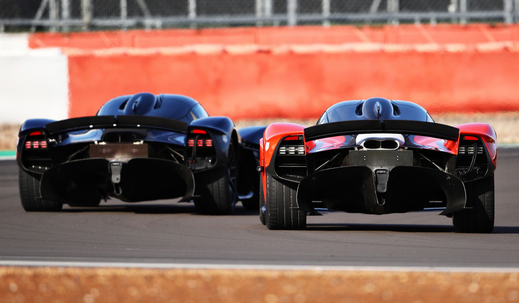 Red Bull Racing F1 drivers Max Verstappen (left) and Alex Albon test the Aston Martin Valkyrie