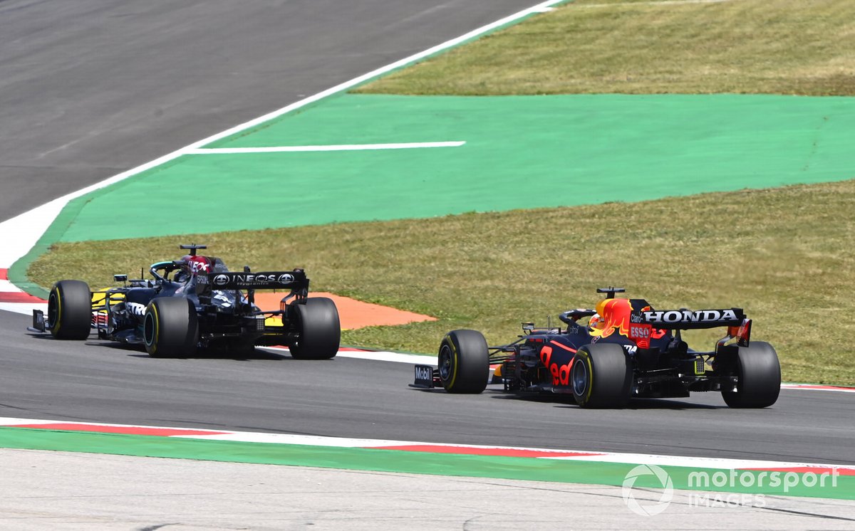 Lewis Hamilton, Mercedes W12, overtakes Max Verstappen, Red Bull Racing RB16B