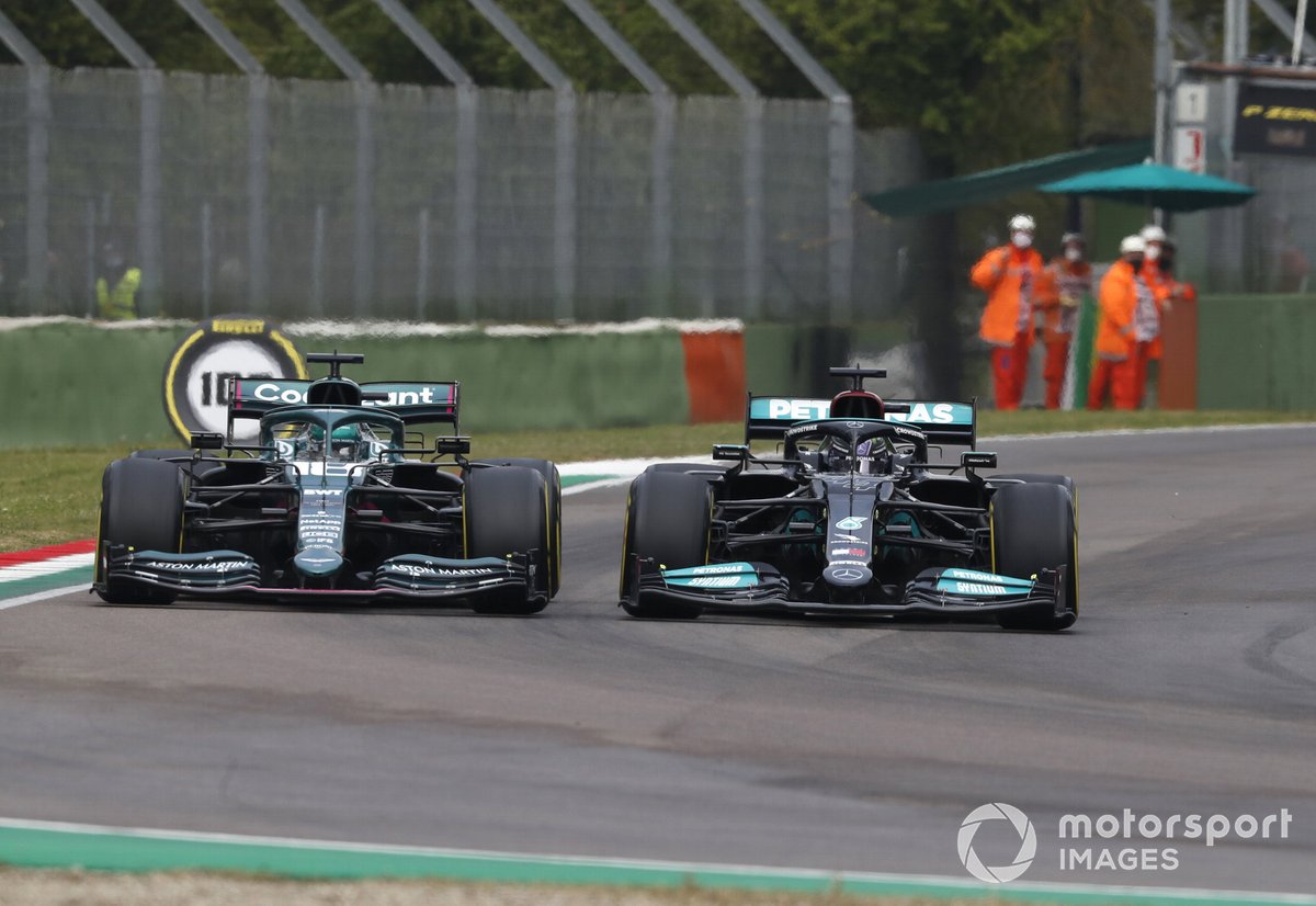 Lewis Hamilton, Mercedes W12, fights with Lance Stroll, Aston Martin AMR21