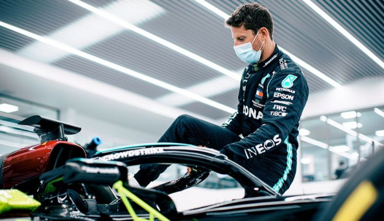 Grosjean gets into an F1 Mercedes in Brackley