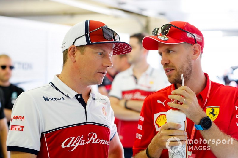 Kimi Raikkonen, Alfa Romeo Racing and Sebastian Vettel, Ferrari before the driver parade 