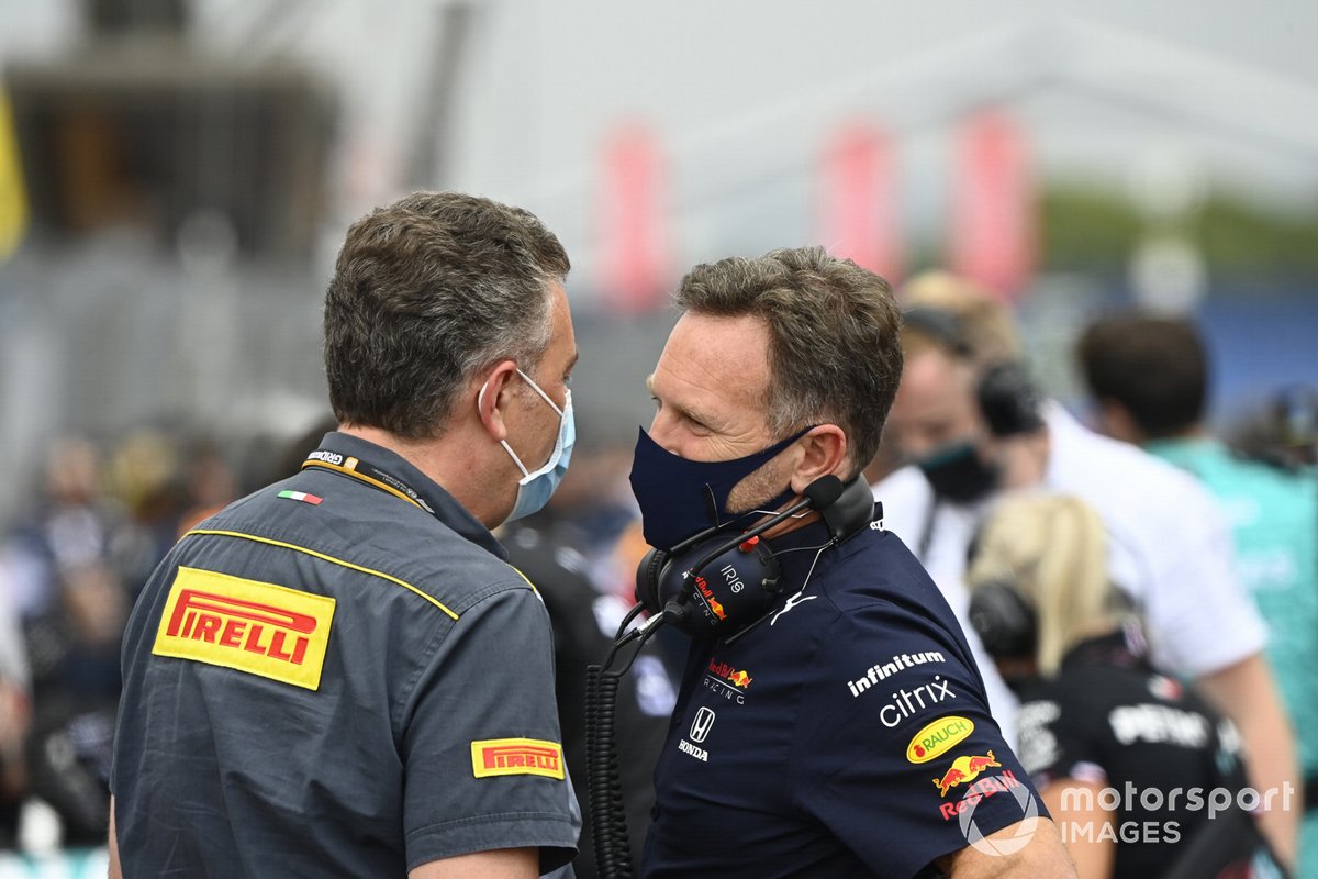 Mario Isola, Racing Manager, Pirelli Motorsport, with Christian Horner, Team Principal, Red Bull Racing 
