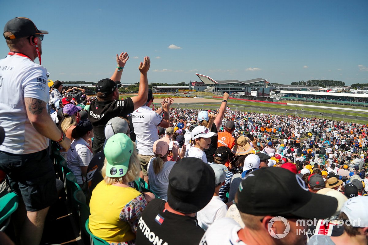 Fans cheer from the grandstands