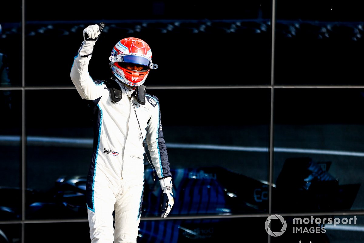 George Russell, Williams, waves to fans from Parc Ferme after Qualifying