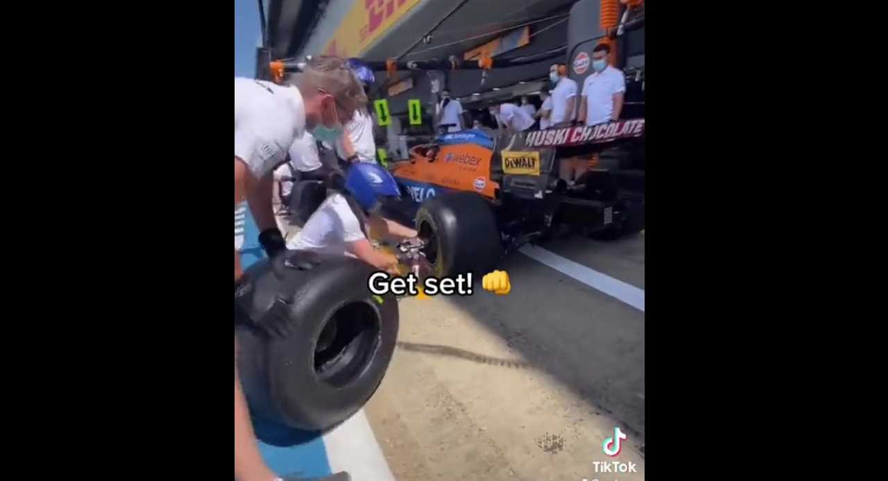 McLaren's F1 team demonstrates how his crew prepares the pit lane before a Grand Prix