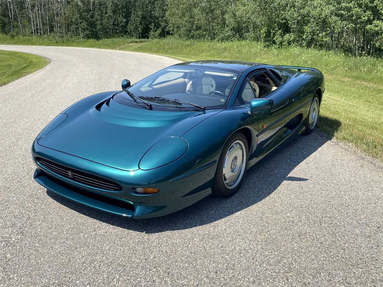 This immaculate 1994 Jaguar XJ220 with 1,800 miles could fetch nearly half a million dollars at auction!