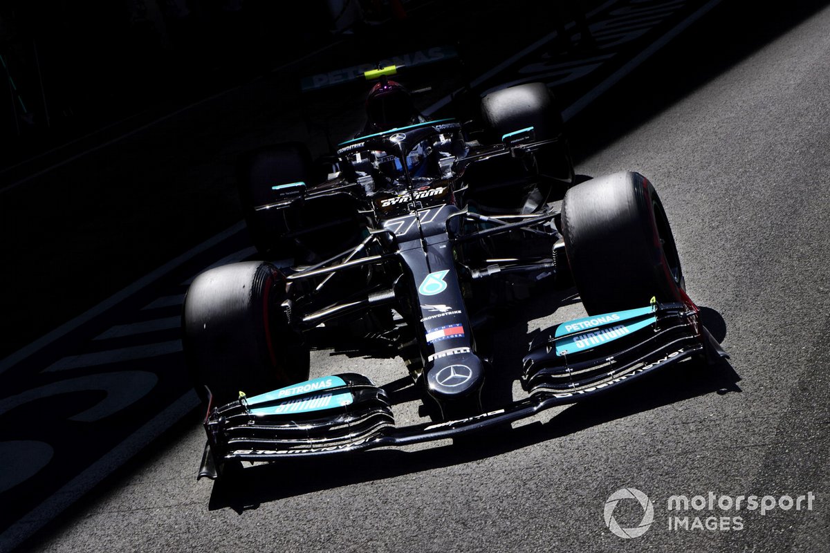 Valtteri Bottas, Mercedes W12, leaves the garage