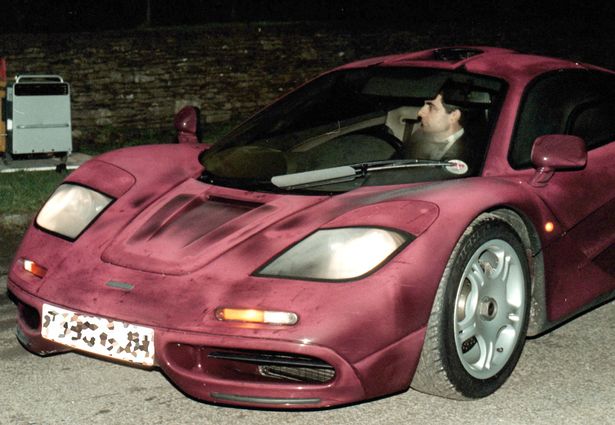 Rowan Atkinson at the wheel of his McLaren F1 supercar, which he owned from 1997 to 2015