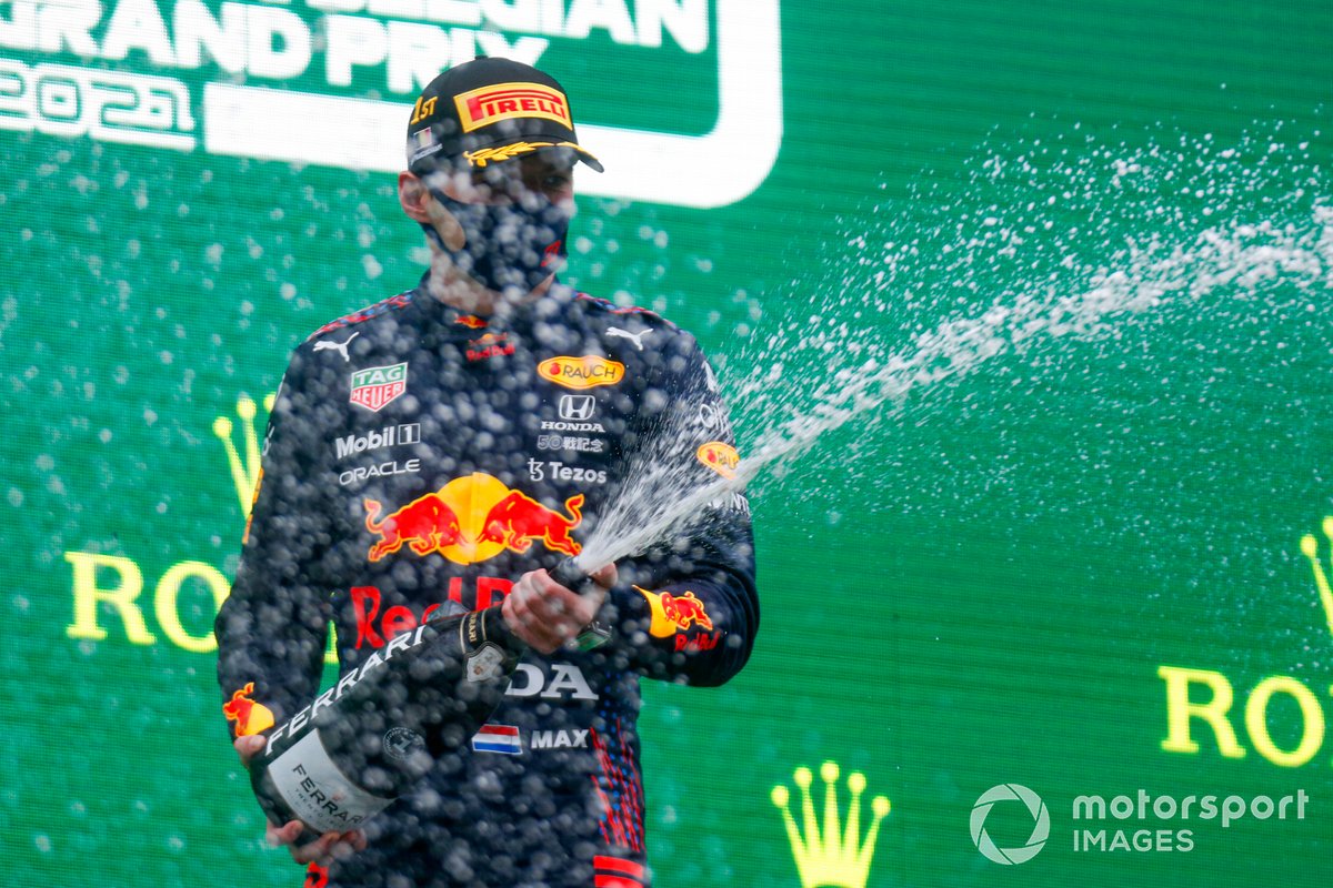 Max Verstappen, Red Bull Racing, 1st position, sprays Champagne on the podium