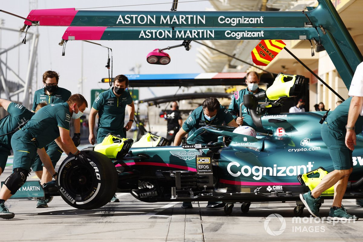 Sebastian Vettel, Aston Martin AMR21, returns to the garage