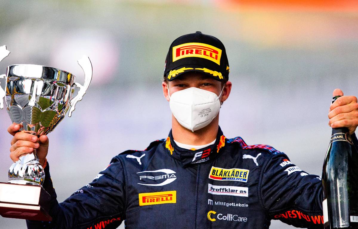 Red Bull's Dennis Hauger celebrates victory.  Austria, July 2021.