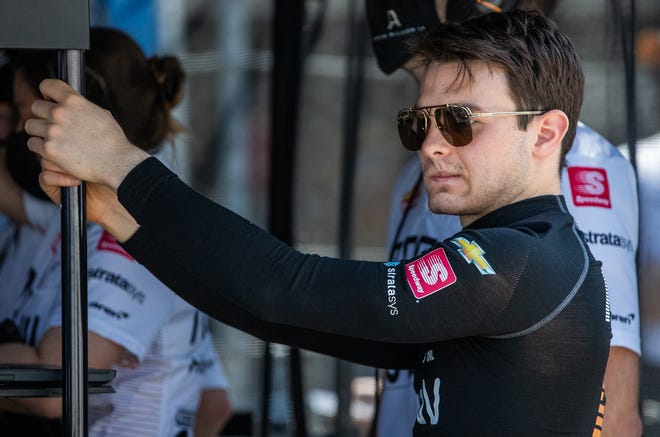 Arrow McLaren SP driver Pato O'Ward (5) sits in his pit area ahead of the third day of practice for the 105th round of the Indianapolis 500 at Indianapolis Motor Speedway on Thursday, May 20, 2021.