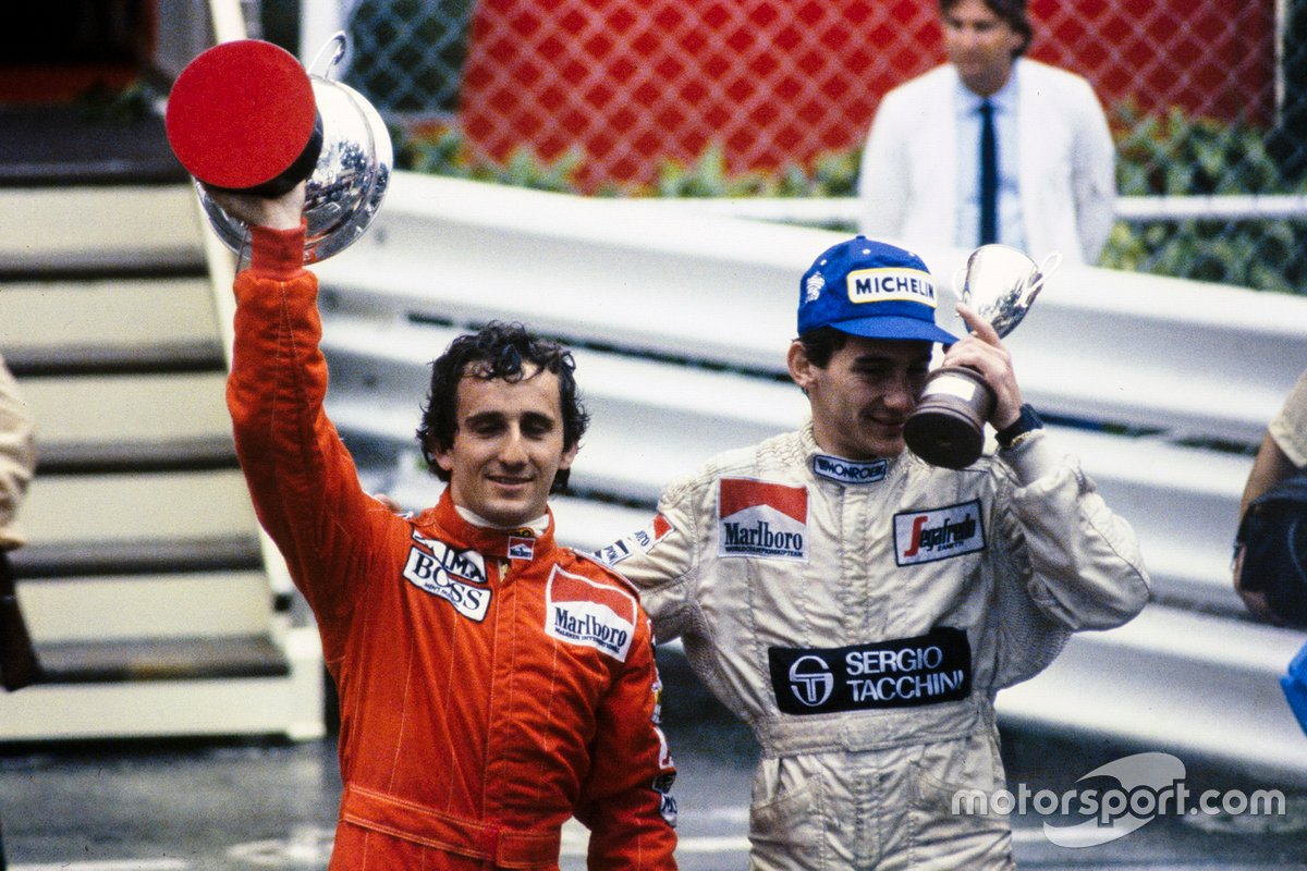 Race winners Alain Prost, McLaren and Ayrton Senna, Toleman, with their trophies