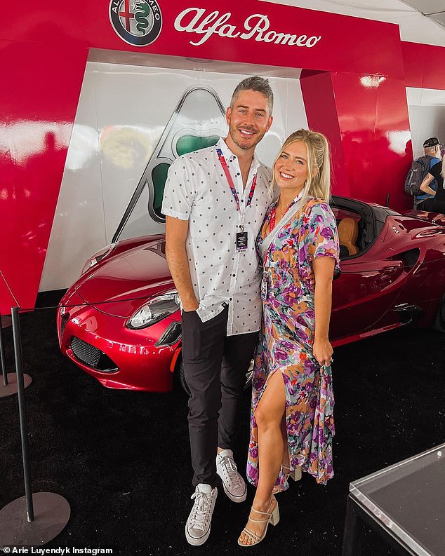 Vroom: Bachelor Arie Luyendyk and his wife Lauren Luyendyk had fun with cars over the weekend. The lovebirds - who have three children - visited Alfa Romeo's F1 in Austin, Texas, and posed in front of cars on the track