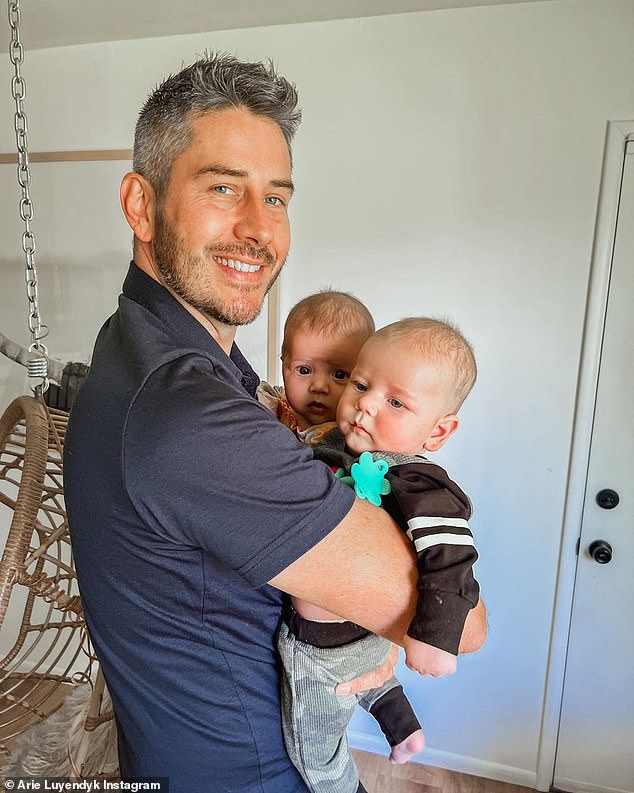 Busy man: he has three children with his wife;  here he can be seen with the youngest