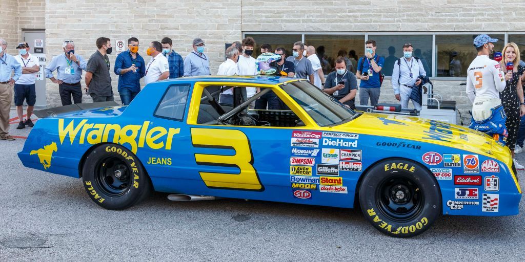 McLaren F1's Daniel Ricciardo drives Dale Earnhardt's 1984 NASCAR Chevy Monte Carlo