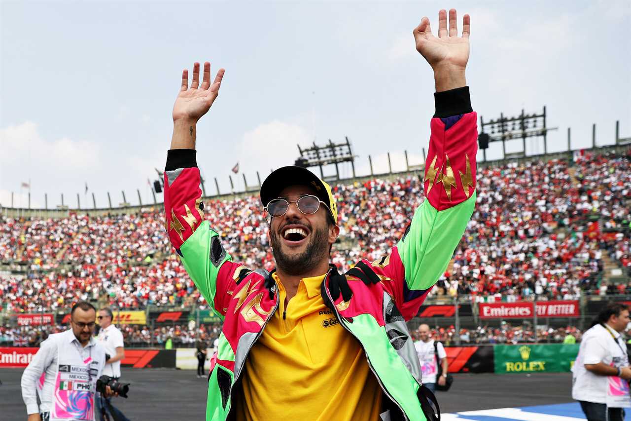 Daniel Ricciardo of Renault Sport F1 waves to the Formula 1 crowd at the driver parade