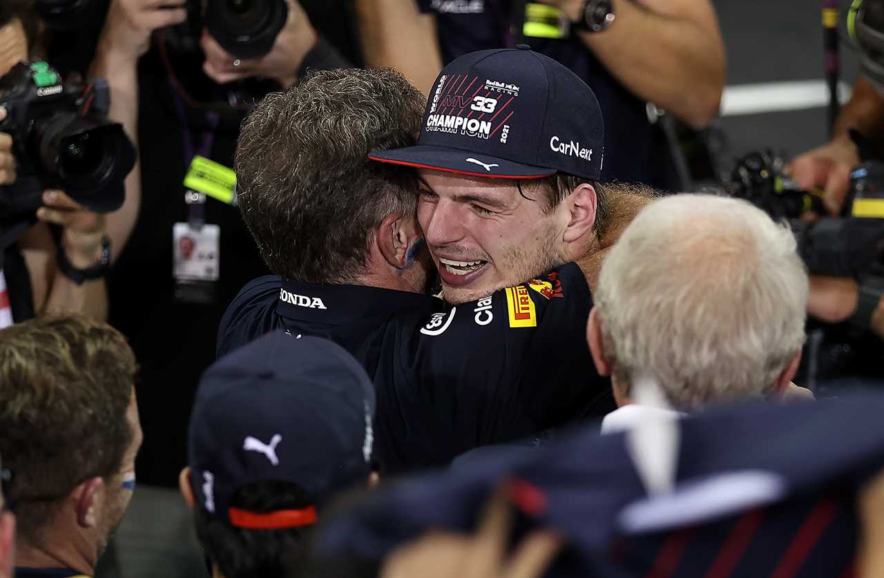 Men hug after victory.