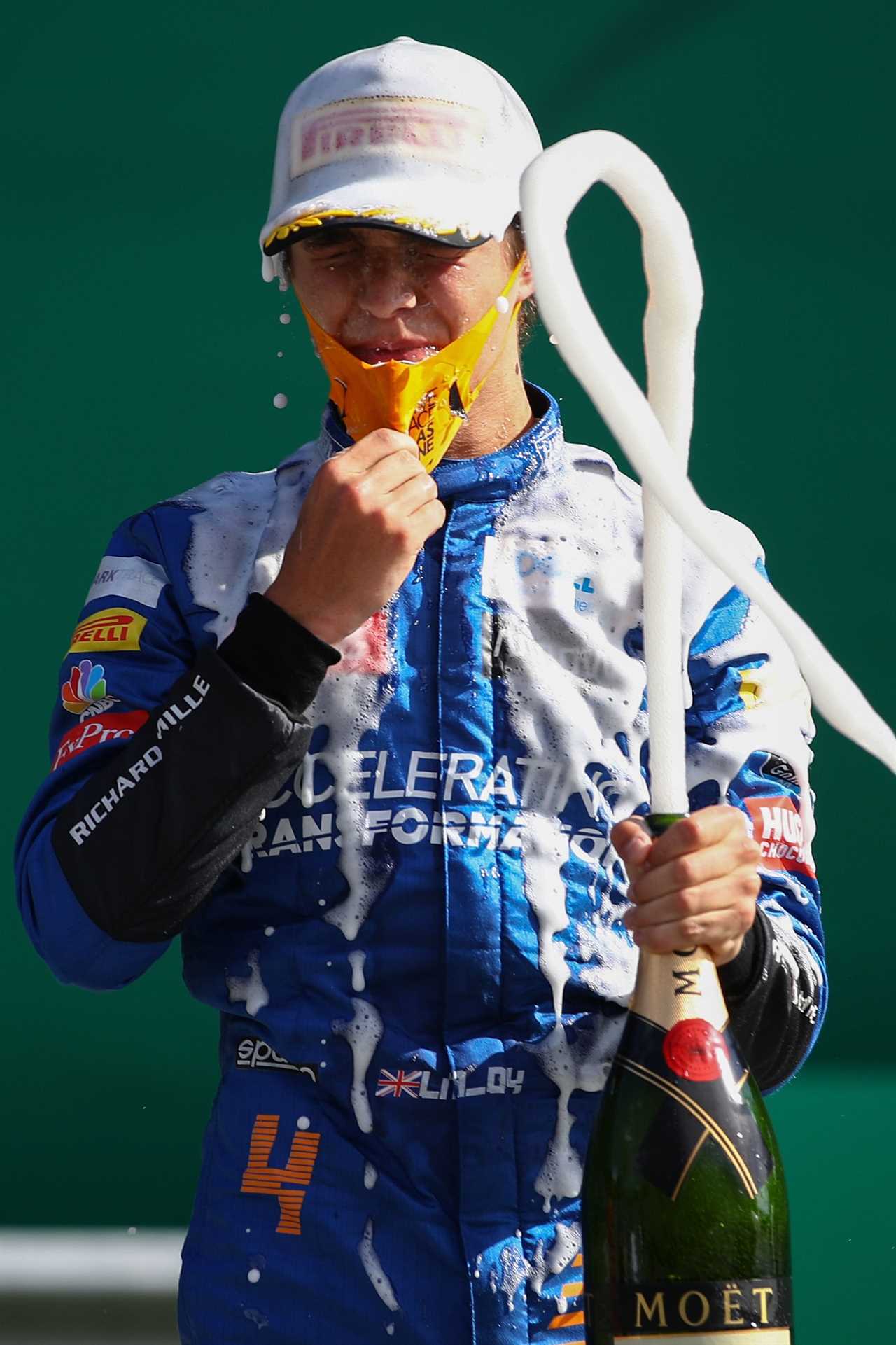 McLaren's British driver Lando Norris celebrates with champagne on the podium after the Austrian Formula 1 Grand Prix race on July 5, 2020 in Spielberg, Austria Photo by Mark Thompson Pool Afp Photo by Mark Thompsonpoolafp via Getty Images