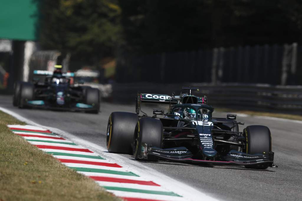 Lance Stroll, Aston Martin Amr21, leads Valtteri Bottas, Mercedes W12
