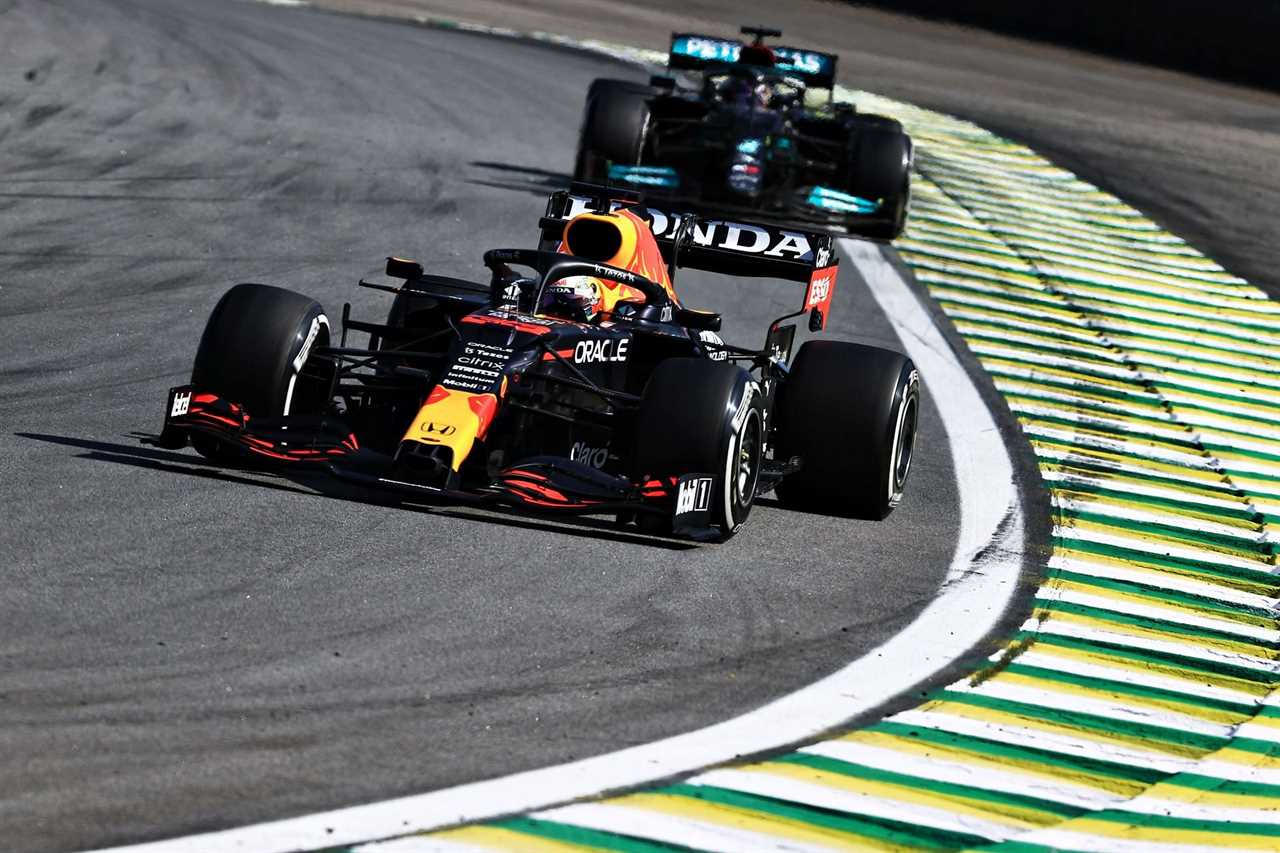 Max Verstappen (front) being chased by Lewis Hamilton (back) at the Sao Paulo Grand Prix in Brazil (Photo by Buda Mendes/Getty Images)