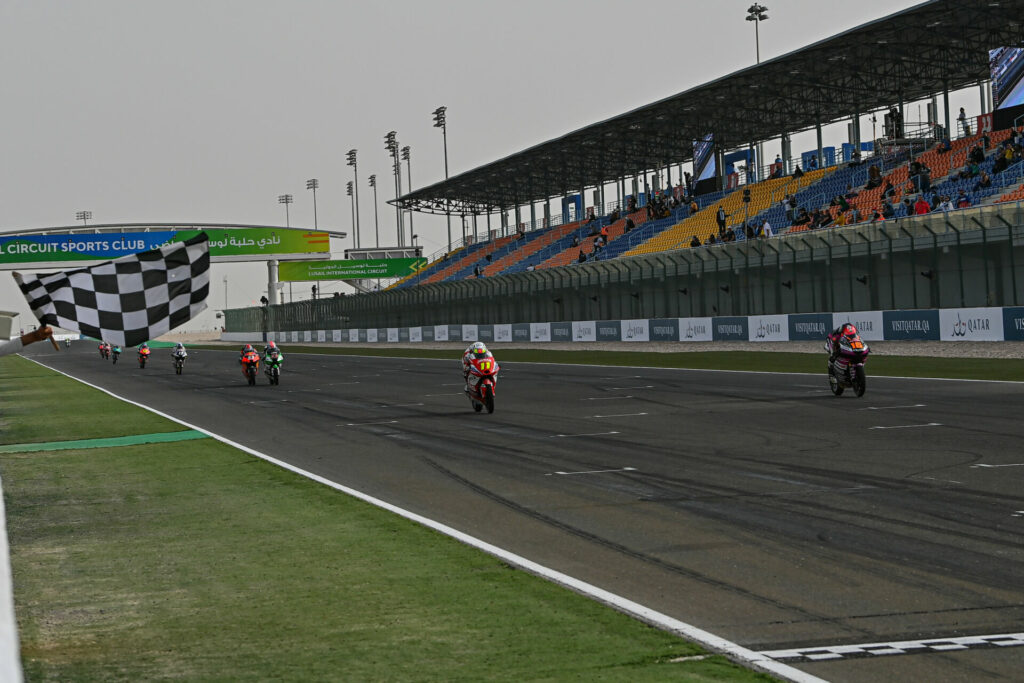 The Moto3 race finish with Andrea Migno (16) beating Sergio Garcia (11) to the checkered flag. Photo courtesy Dorna.