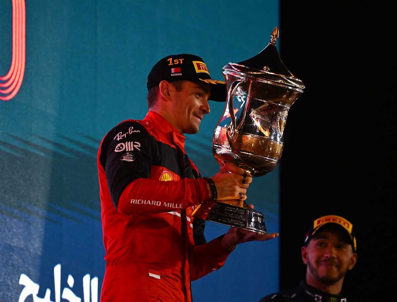 Ferrari's Charles Leclerc celebrates on the podium during the F1 Grand Prix of Bahrain (Photo by Clive Mason/Getty Images)