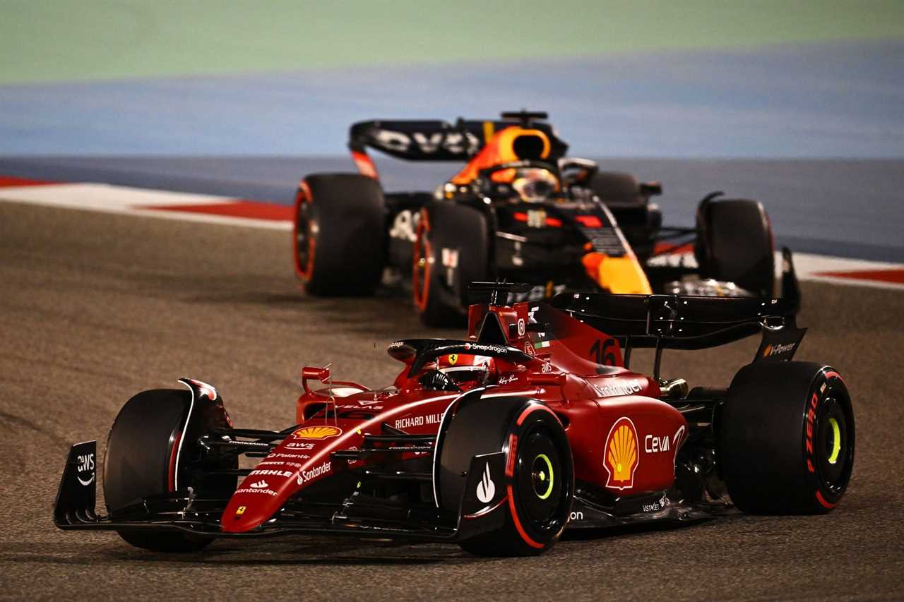 Ferrari's Charles Leclerc (foreground) tussles with Red Bull's Max Verstappen (background) during the 2022 F1 Bahrain GP (Photo by Clive Mason/Getty Images)