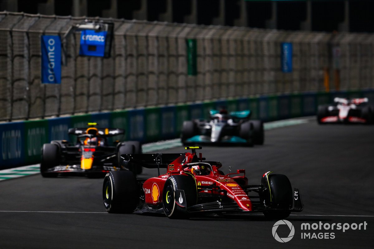 Carlos Sainz Jr Ferrari F1-75 Sergio Perez Red Bull Racing RB18 George Russell Mercedes W13