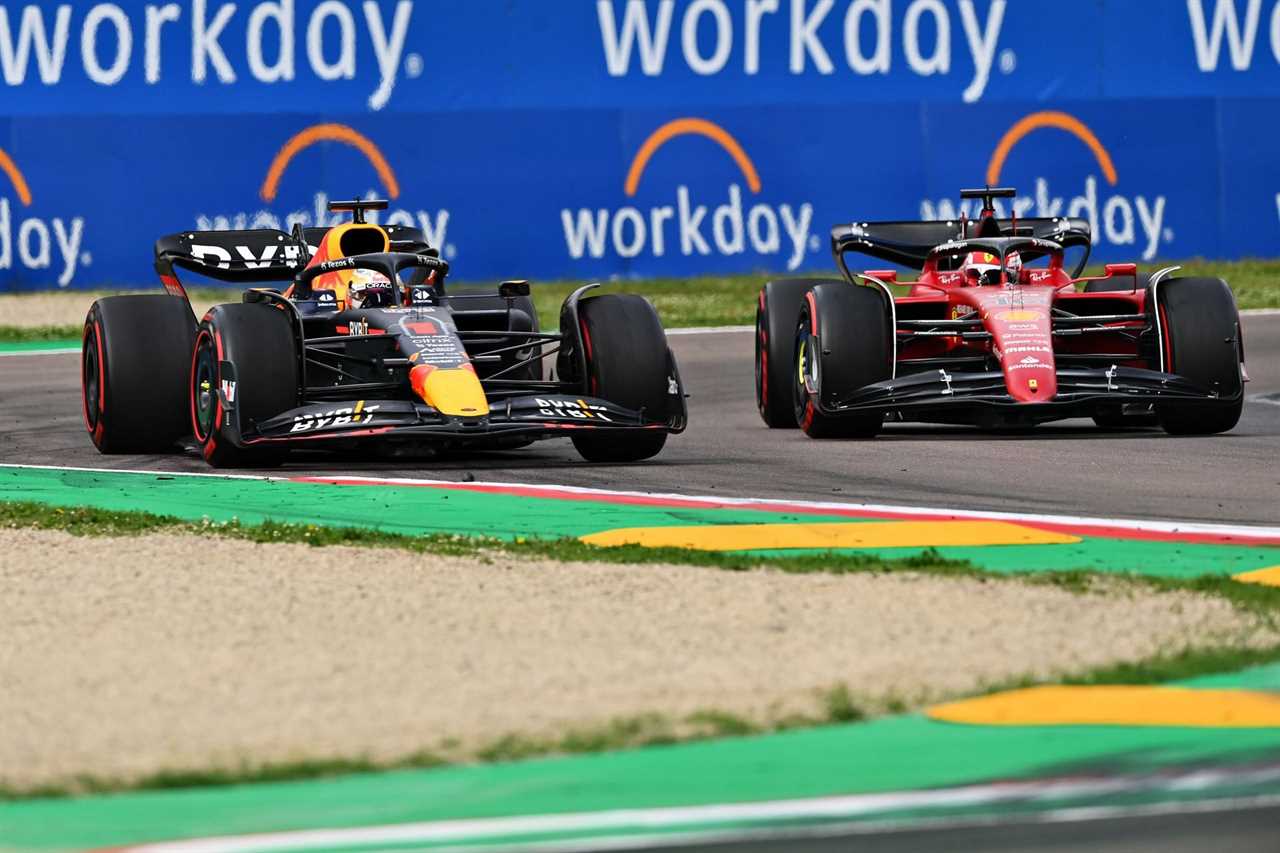 Red Bull's Max Verstappen (left) overtakes Ferrari's Charles Leclerc (right) during the 2022 F1 Imola GP Sprint (Photo by Dan Mullan/Getty Images)