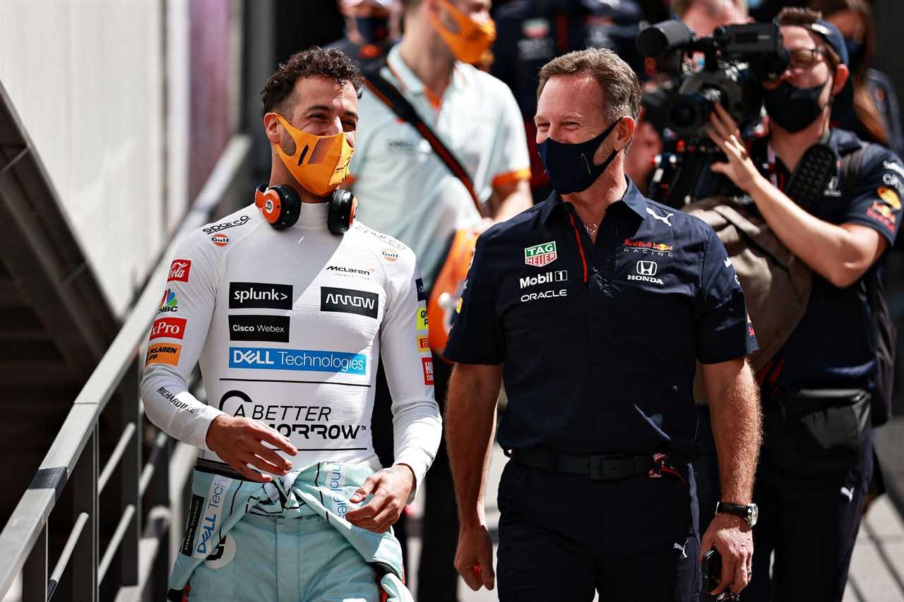 Daniel Ricciardo (left) in conversation with Christian Horner (right) during the 2021 F1 Grand Prix of Monaco - Practice