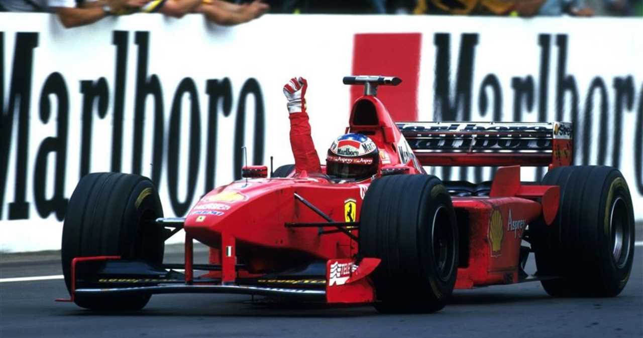 Michael Schumacher on track in red Ferrari F1 car