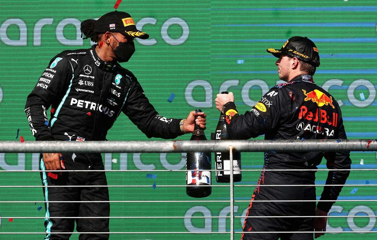 F1 Grand Prix of USA - Max Verstappen and Lewis Hamilton celebrate on the podium.