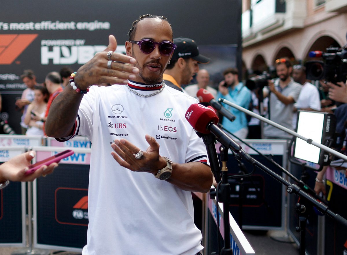 Mercedes F1 Trailblazer Lewis Hamilton Waves Ferrari Flag in Support of Charles Leclerc