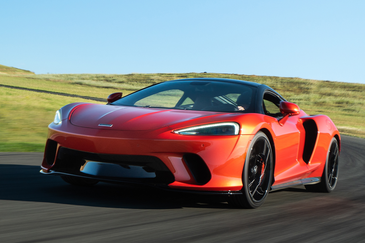 An orange 2022 McLaren GT, which is currently being given away by Omaze. Here's why "the golfer's supercar" is the supercar you should want.