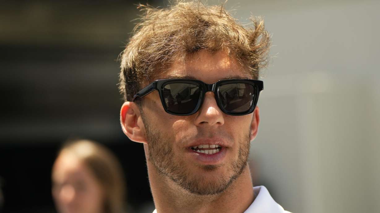 AlphaTauri driver Pierre Gasly of France arrives prior to the third free practice at the Baku circuit, in Baku, Azerbaijan, Saturday, June 11, 2022. The Formula One Grand Prix will be held on Sunday.