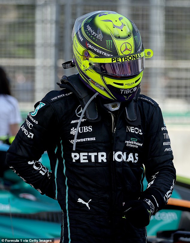 Lewis Hamilton clutches at his lower back after finishing fourth in the Azerbaijan GP, ​​telling his Mercedes team to 'make some changes'
