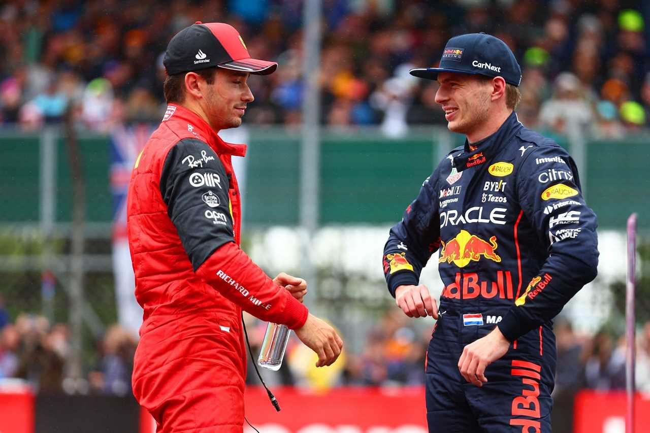 Ferrari driver Charles Leclerc (left) and Red Bull driver Max Verstappen (right) share a moment after qualifying for the 2022 F1 British GP (Photo by Mark Thompson/Getty Images)