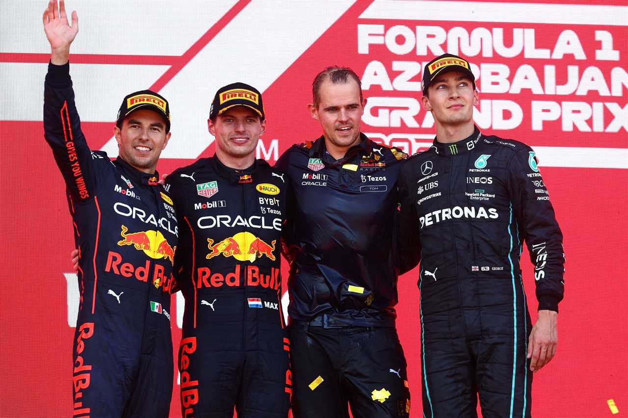 Max Verstappen (second from left) led Red Bull's third 1-2 of the 2022 F1 season at Baku