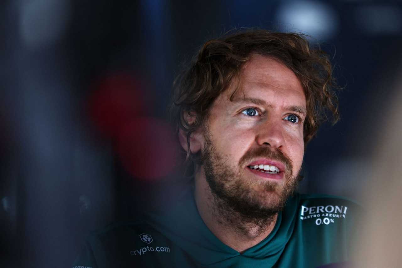 Aston Martin F1 driver Sebastian Vettel speaks to the media prior to the 2022 F1 Austrian GP. (Photo by Bryn Lennon/Getty Images)